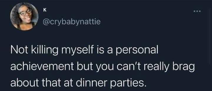 A screenshot of a tweet from user @crybabynattie, featuring a profile picture of a smiling woman with glasses and curly…