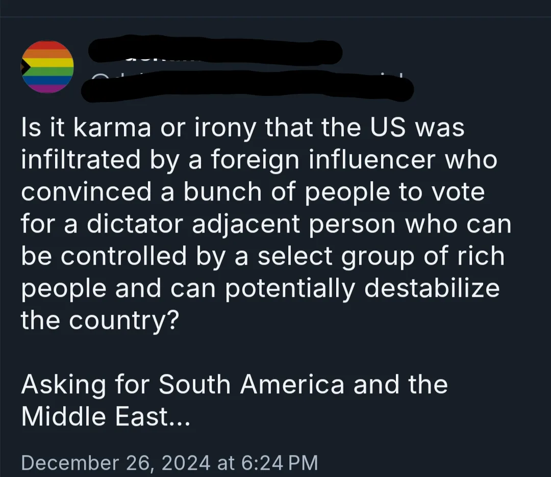 A screenshot of a dark-mode social media post with a rainbow flag profile picture, where the user's name and post details…