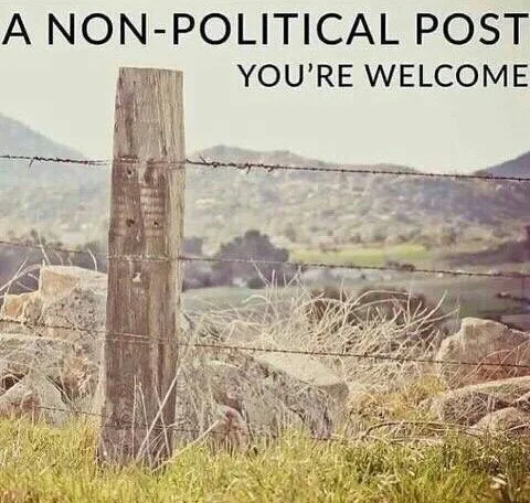 A rustic wooden fence post with barbed wire stands in a grassy field with hills in the background. Overlaid text reads 'A…