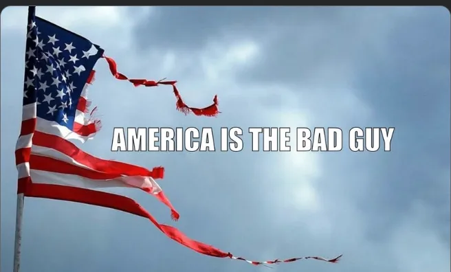 An American flag is shown flying in the wind against a cloudy sky, but its red stripes are torn and frayed into long, ragged…