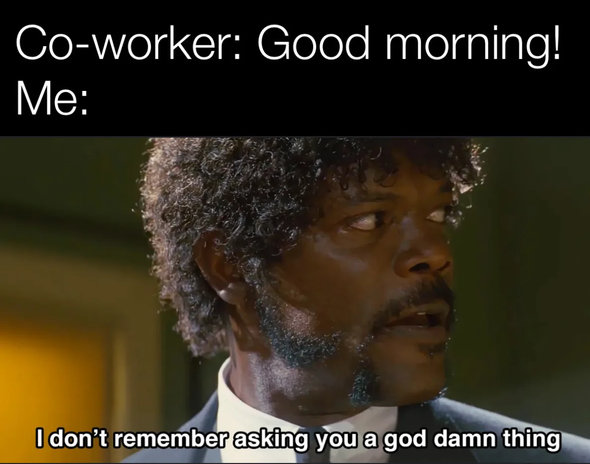 A close-up of actor Samuel L. Jackson in a suit, looking intensely sideways with a skeptical expression. The top text reads…