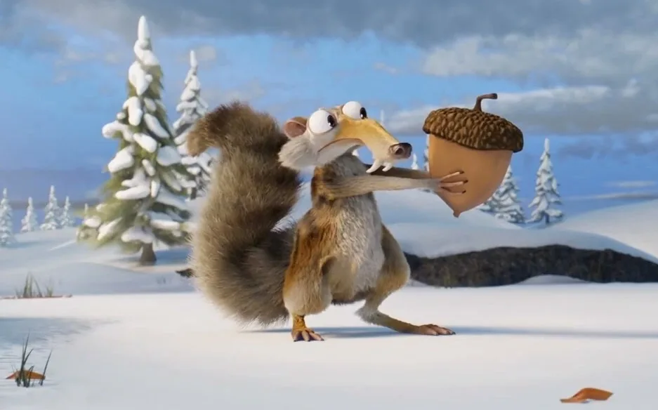 An animated squirrel with a large bushy tail stands in a snowy landscape holding an acorn with both hands, eyes wide and…