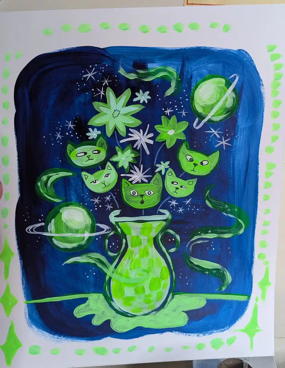 A hand-painted artwork depicts a green patterned vase overflowing with green cat faces, green flowers, and green planets…