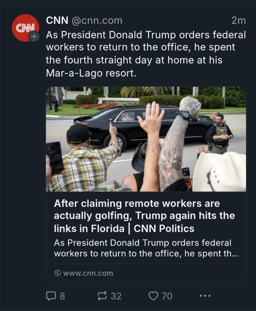 A screenshot of a CNN tweet showing a black limousine with a person inside, surrounded by people raising their hands and…