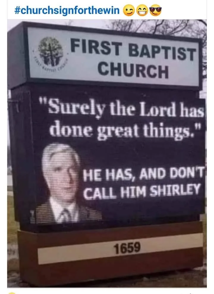 A church sign for First Baptist Church displays the biblical quote 'Surely the Lord has done great things.' Below it, a…