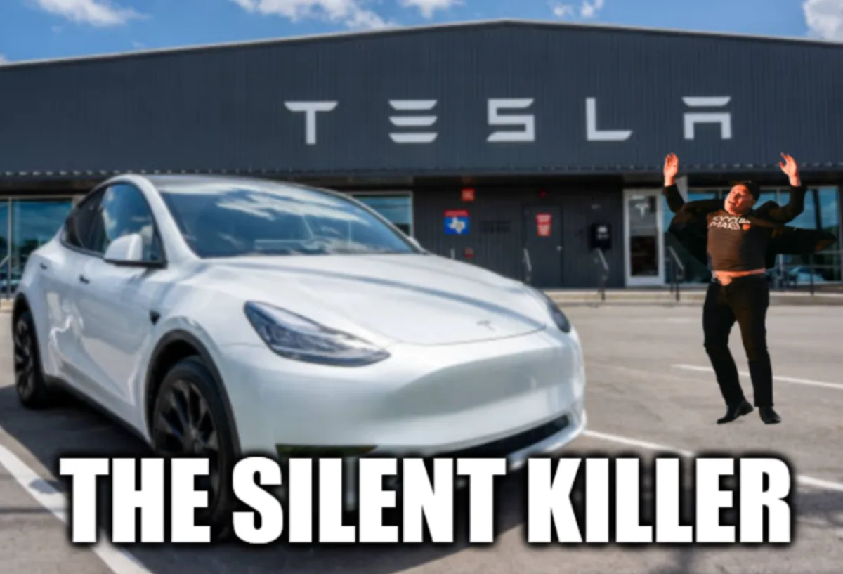 A white Tesla Model Y is parked in front of a Tesla dealership building with the company logo visible. A man in a black…