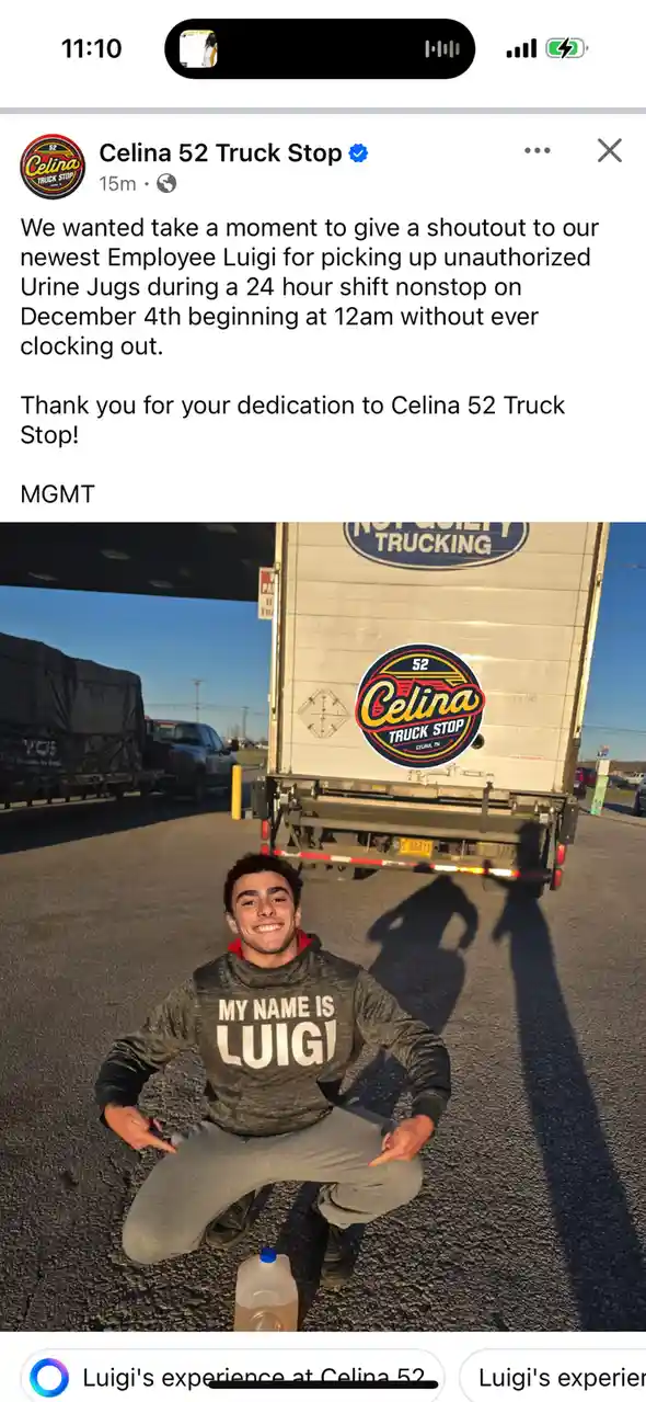 A young man named Luigi, wearing a shirt that says 'MY NAME IS LUIGI', kneels on asphalt in front of a truck with 'Celina 52…