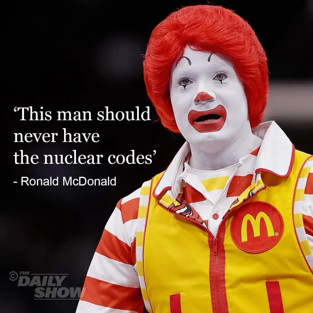 A person dressed as Ronald McDonald, the iconic McDonald's mascot, is shown with a visibly distressed and tearful…