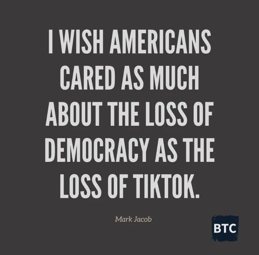 A dark gray background features large white text stating 'I WISH AMERICANS CARED AS MUCH ABOUT THE LOSS OF DEMOCRACY AS THE…