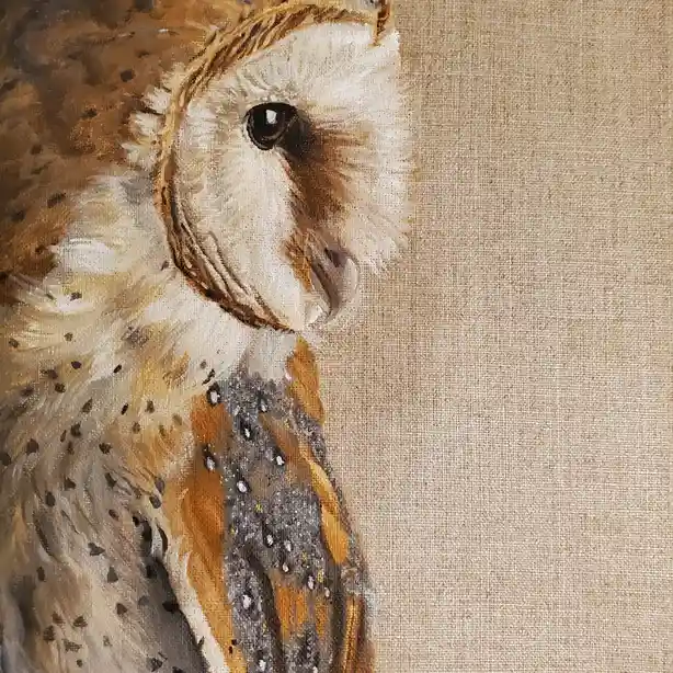 A close-up painting of a barn owl's head and upper chest, showing its white facial disc, dark eyes, and brown-speckled…