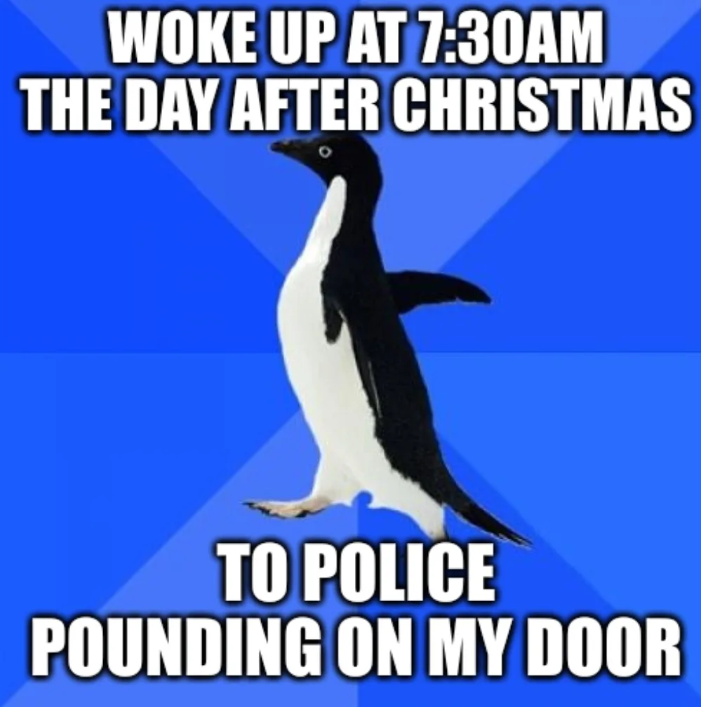 A black-and-white penguin stands against a blue background with diagonal stripes. The text overlaid in bold white letters…