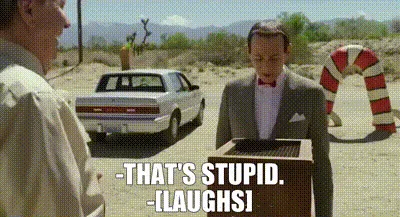 A still from the movie 'The Sting' shows a man in a suit and bow tie standing behind a wooden podium in a desert setting…