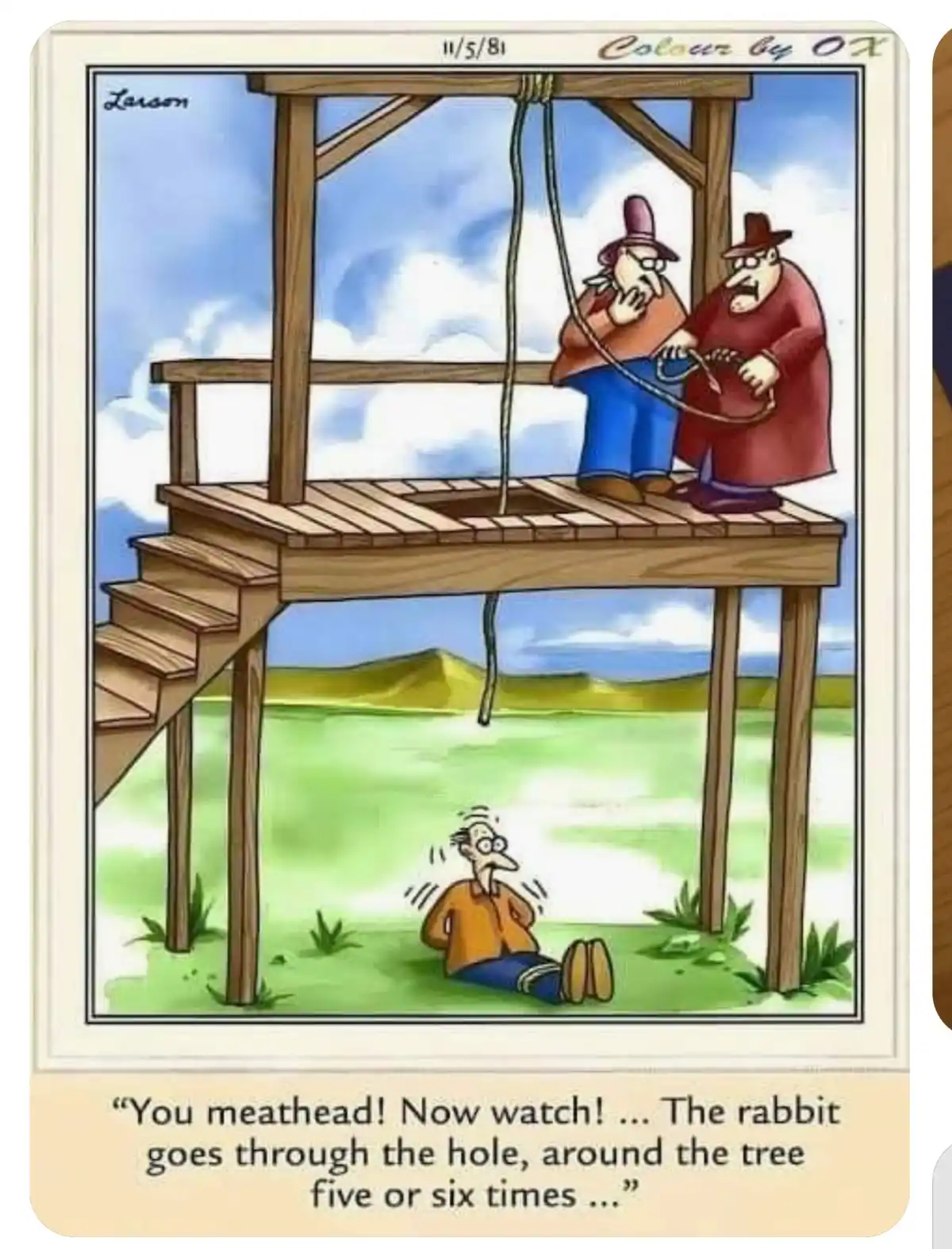 Two men stand on a wooden platform above a hole, one holding a rope attached to a man below who is sitting on the ground…