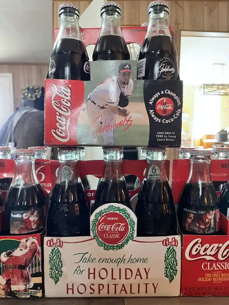 Check out my impressive Coca-Cola bottle collection!