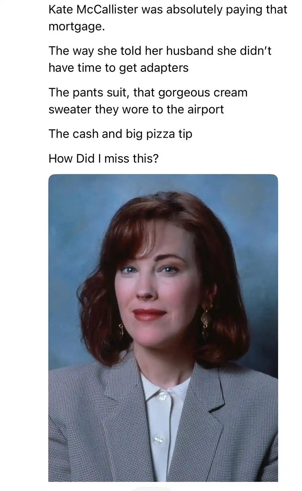 A still image of Kate McCallister from the TV show 'Friends', smiling slightly while wearing a grey checkered pantsuit over…