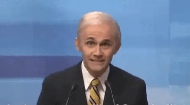 A composite image shows a man in a suit and tie speaking at a podium, with text progressively revealing the phrase 'The…