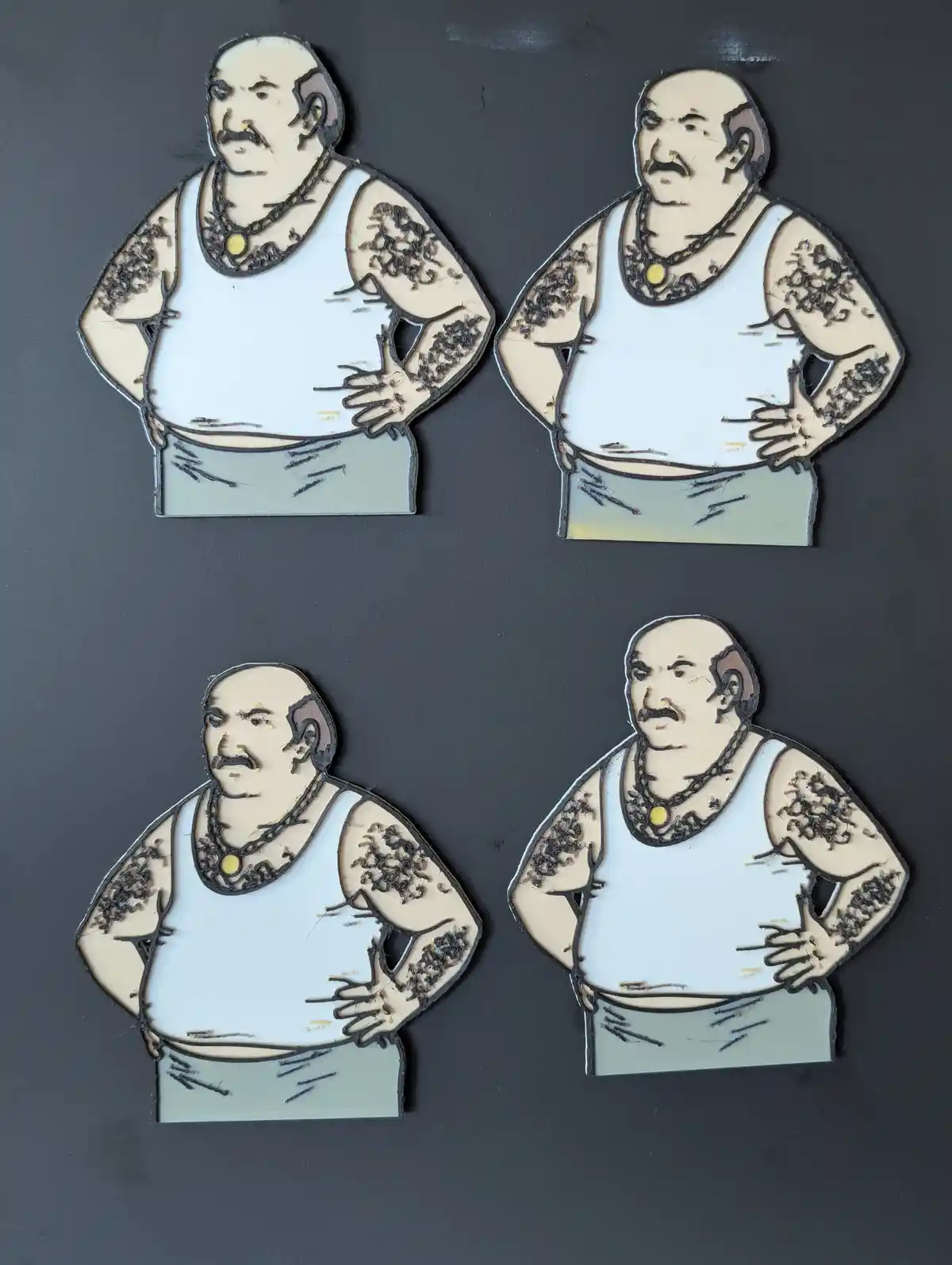 Four identical cutout figures of a bald, mustachioed, overweight man in a white tank top and chain necklace are arranged in…