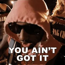A six-panel image grid shows a man in a pink hoodie and sunglasses, progressively changing his facial expression from…