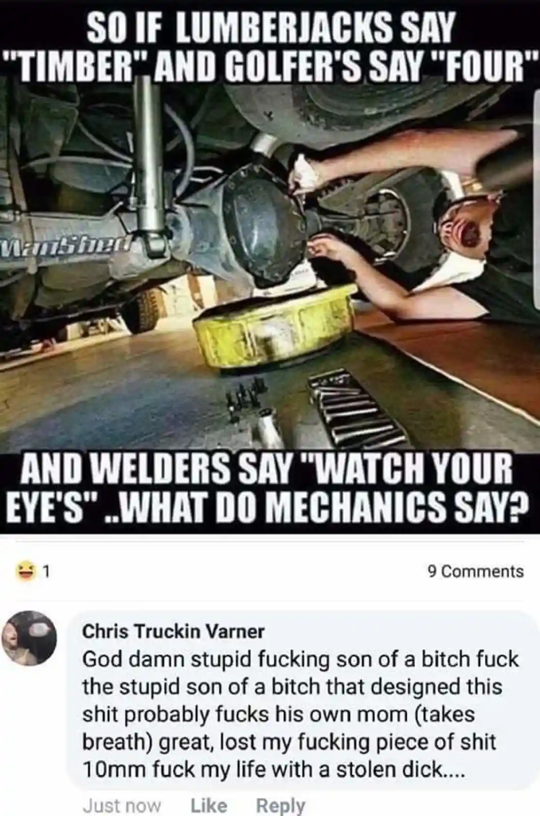 A mechanic is lying on his back under a vehicle, working on the rear axle. Tools are scattered on the floor nearby. The…