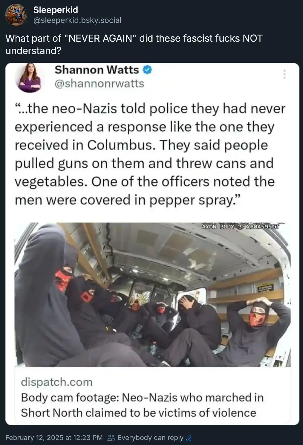 A screenshot of a social media post showing a body cam video of several masked men in dark clothing sitting inside a police…