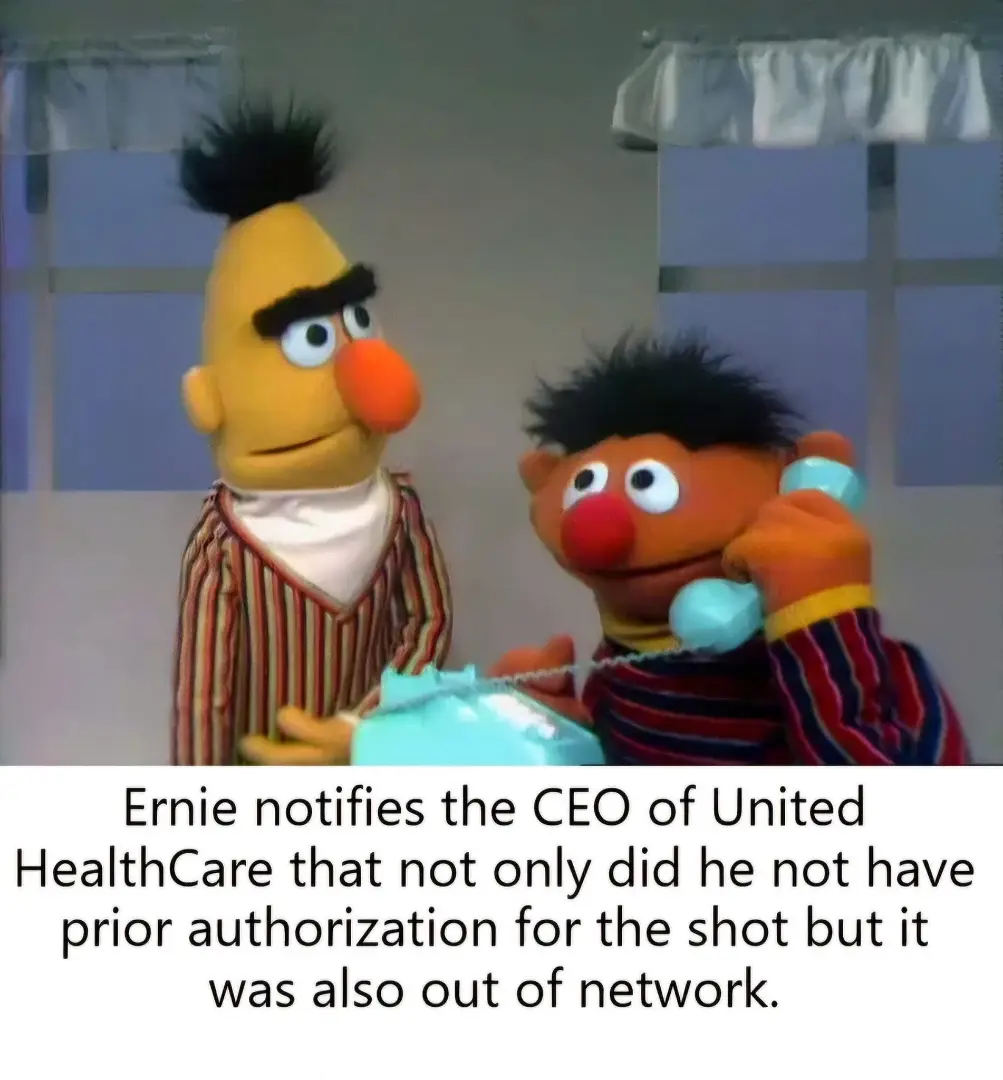 Two Muppet characters, Ernie and Bert, are shown in a room with windows. Ernie holds a light blue rotary phone to his ear…