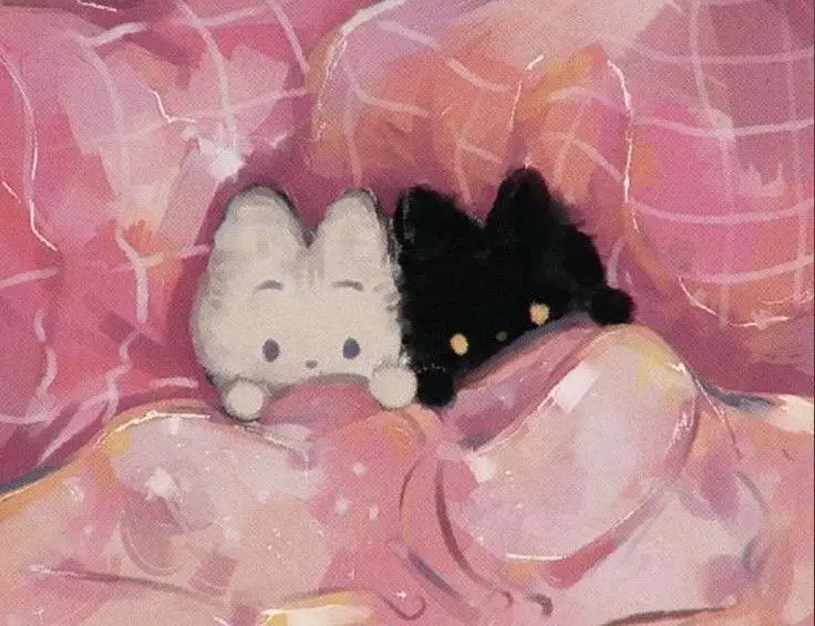 Two stylized plush animals, one white and one black, are snuggled together under a pink blanket on a pink checkered couch…