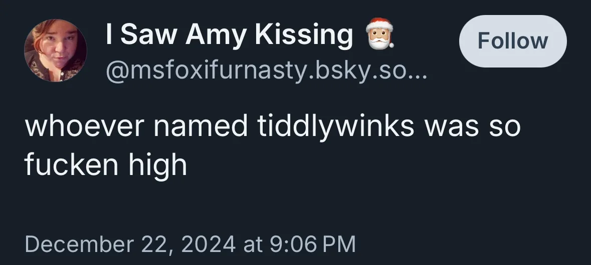 A screenshot of a social media post from a user named 'I Saw Amy Kissing' with a Santa emoji, showing a dark-themed…