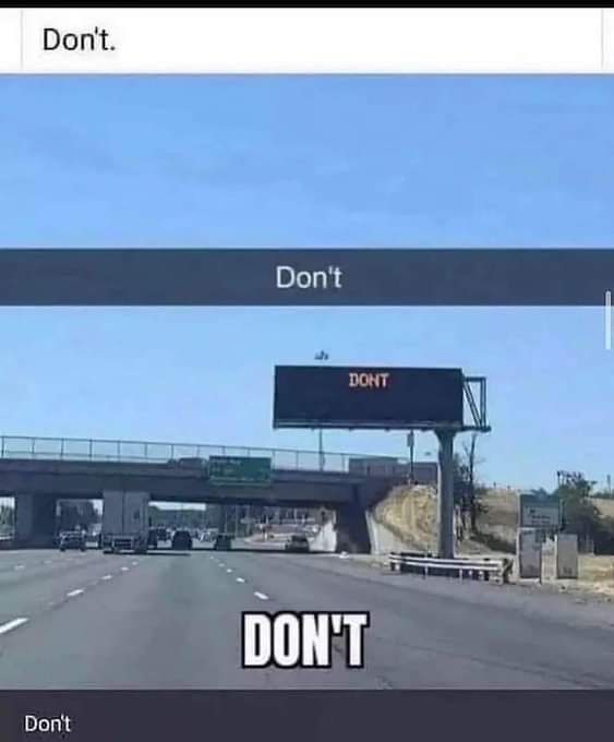 A highway scene with a large electronic billboard displaying 'DONT' in red letters, overlaid with the word 'Don't' in white…