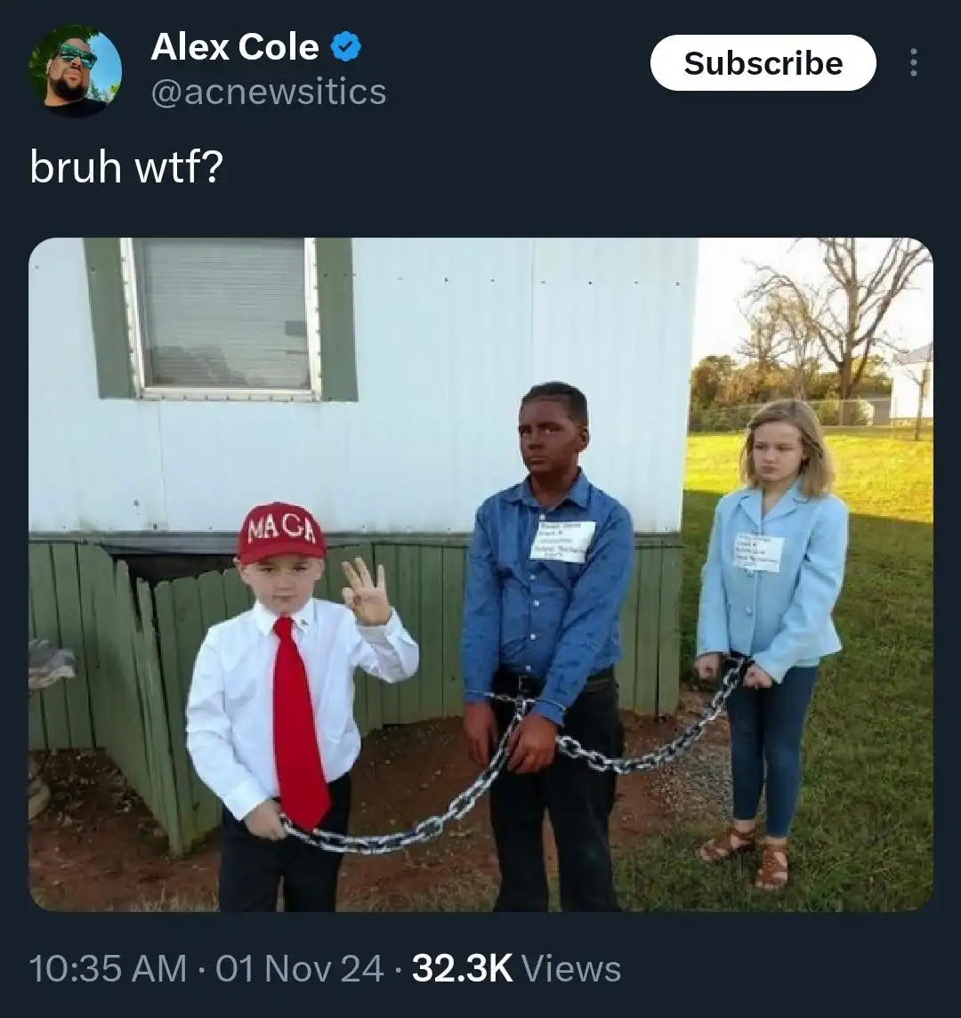 Three children stand outside a house, linked by a chain. The boy on the left wears a red MAGA hat, a white shirt, and red…
