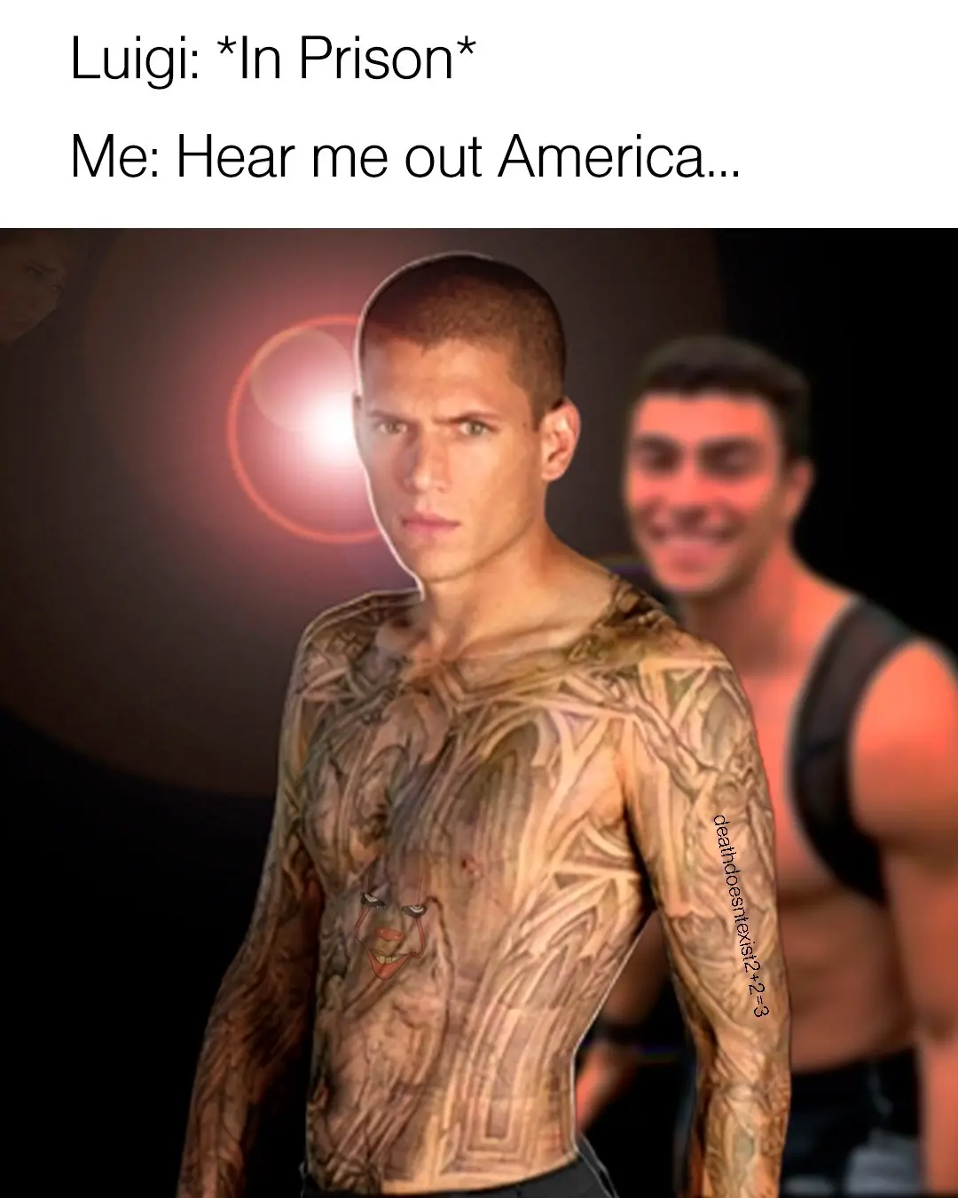 A shirtless man with intricate tattoos covering his torso and arms stands in the foreground, looking intensely at the…
