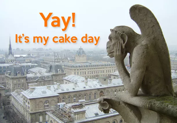 A stone gargoyle statue with wings and a monkey-like face sits atop a building overlooking a cityscape of rooftops and…