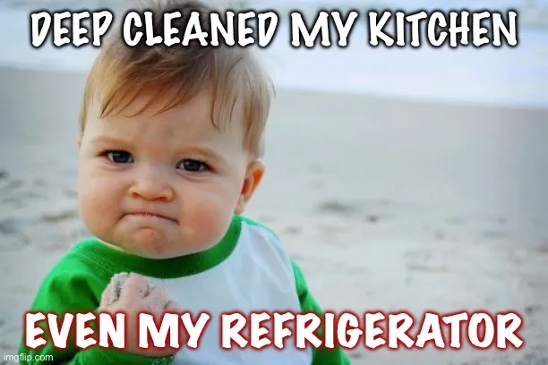 A baby with a smug, self-satisfied expression stands on a sandy beach, wearing a green and white shirt. The text overlaid in…