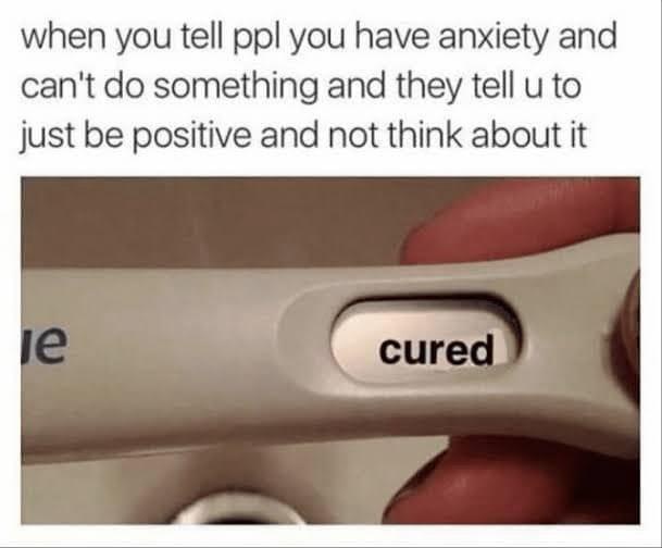 A close-up photo shows a hand holding a white pregnancy test device, with the word 'cured' clearly visible on its display…