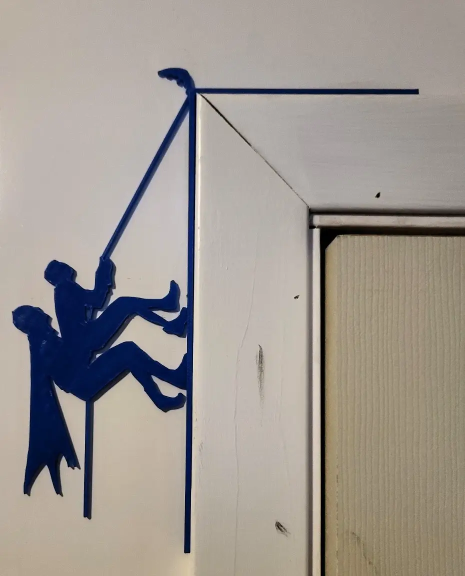 Who Could Resist a Batman & Robin Door Climb?