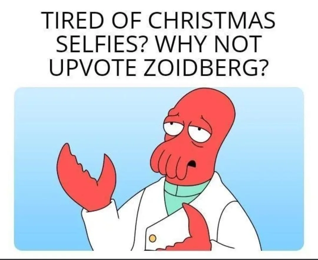 A cartoon red lobster-like alien named Zoidberg, wearing a white lab coat with a green collar, raises one claw in a…