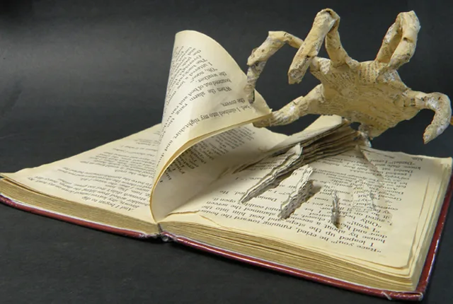 An open, aged book with its pages dramatically curled and twisted into the shape of a humanoid figure with arms and legs…
