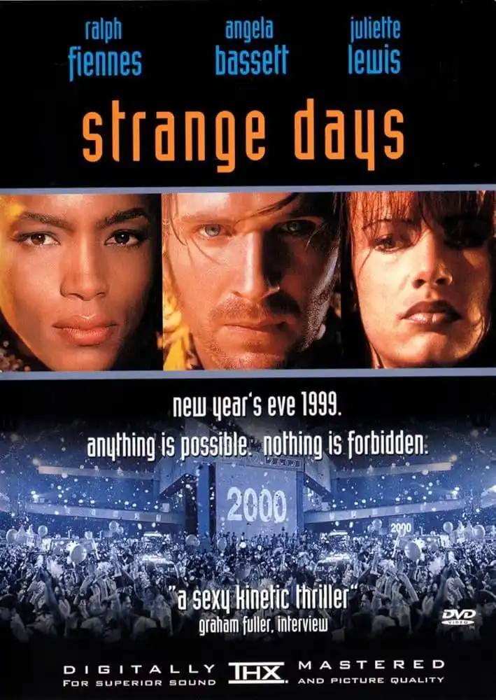 This is a movie poster for 'Strange Days' featuring actors Ralph Fiennes, Angela Bassett, and Juliette Lewis. The poster…