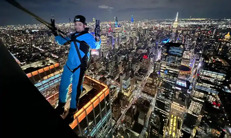 A Breathtaking View from a Skyscraper Overlooking Manhattan at Night!
