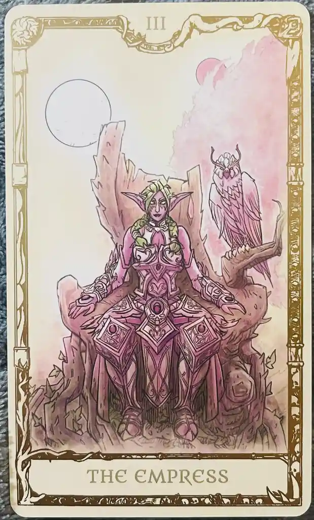 A custom illustrated tarot card labeled 'III' at the top and 'THE EMPRESS' at the bottom, depicting a regal, purple-skinned…