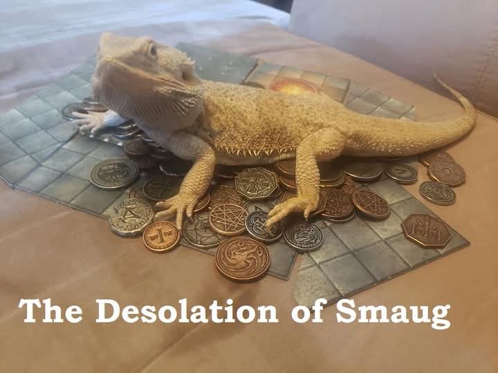 A light-colored bearded dragon lizard is lying on a fantasy-style tiled surface, surrounded by numerous fantasy coins. The…