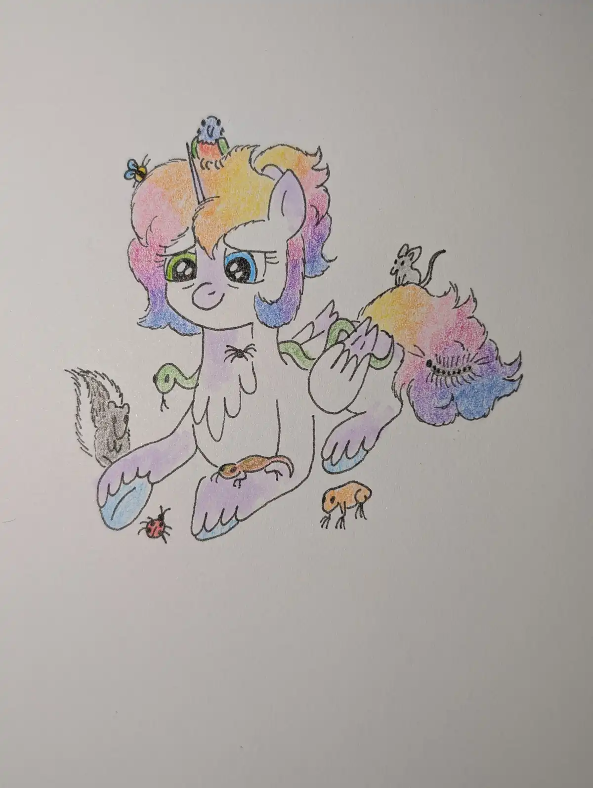 A hand-drawn cartoon pony with rainbow-colored hair and a unicorn horn is surrounded by various small animals including a…