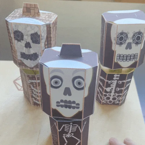 A grid of six identical photos shows three paper craft skeletons with a skull face, ribcage, and brick-patterned torso. The…
