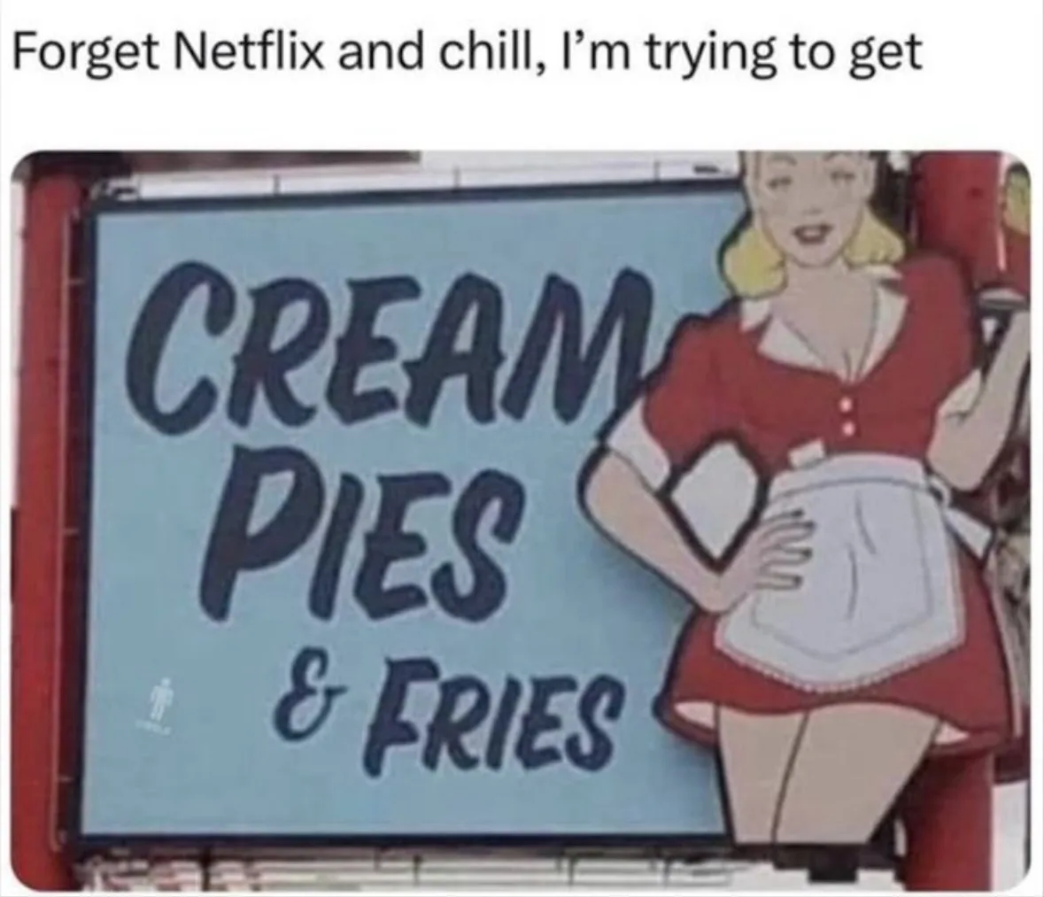 A vintage-style sign features a cartoon woman in a red dress and white apron holding a pie, advertising 'CREAM PIES & FRIES'…
