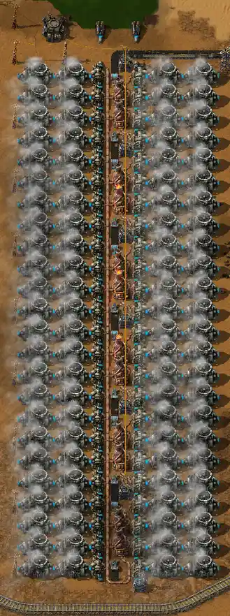 an overhead view of a massive, symmetrical factory layout in a strategy game, featuring two long rows of identical…