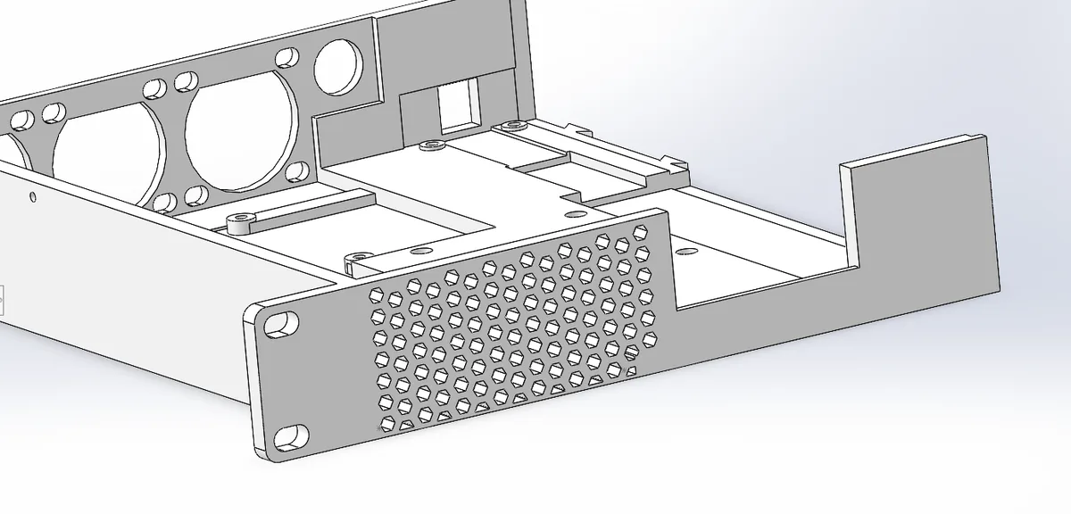 a 3d rendered image of a gray metal electronic enclosure with a perforated front panel, mounting holes, and cutouts for…