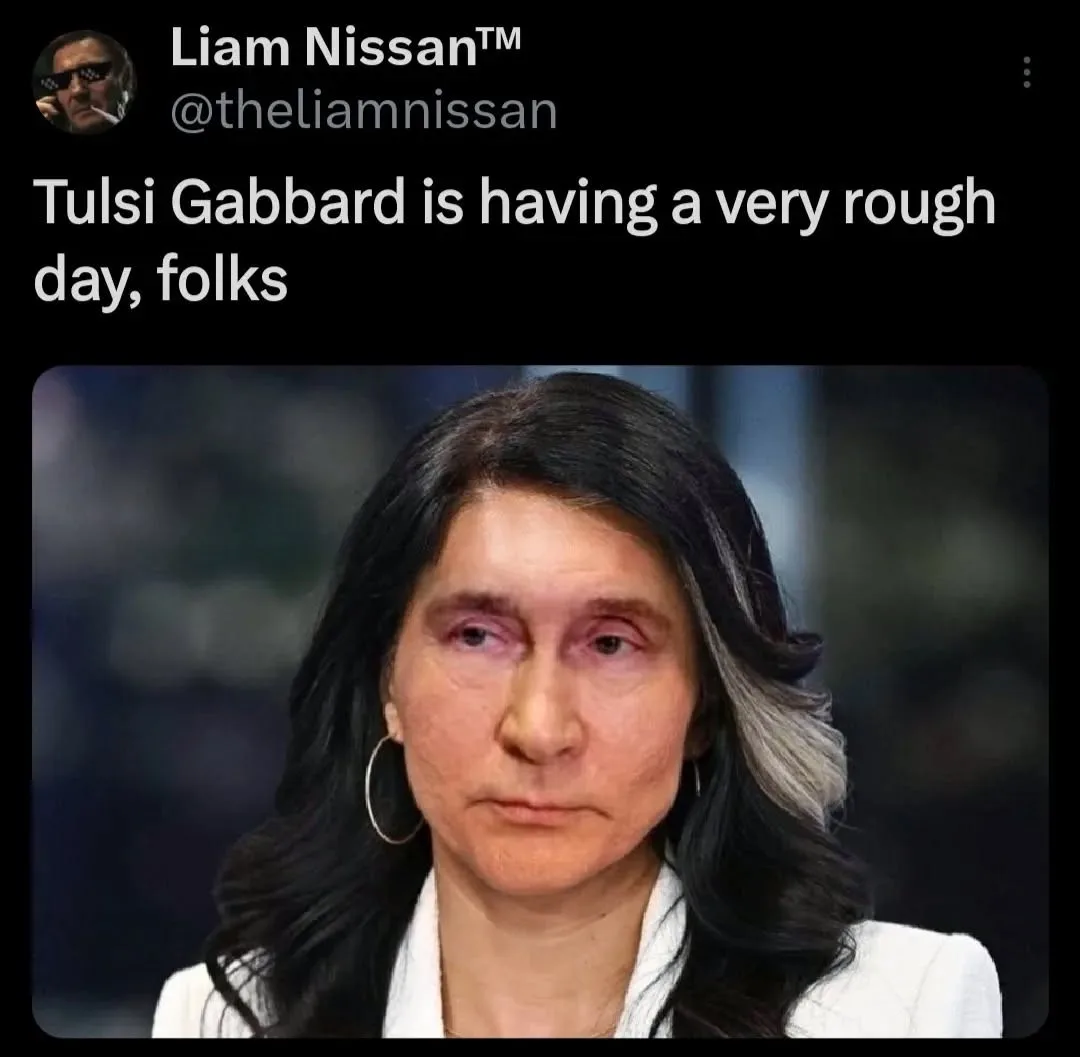 A screenshot of a tweet by Liam Nissan™ (@theliamnissan) shows a close-up photo of Tulsi Gabbard with a visibly tired…