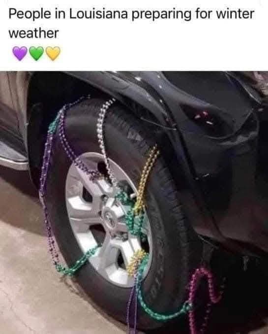 A close-up photo shows a black car's front wheel wrapped in colorful Mardi Gras beads in purple, green, and gold. The…