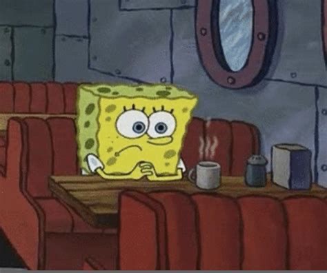 SpongeBob SquarePants sits at a diner booth looking tired and unenthusiastic, with a steaming mug on the table. The overlaid…