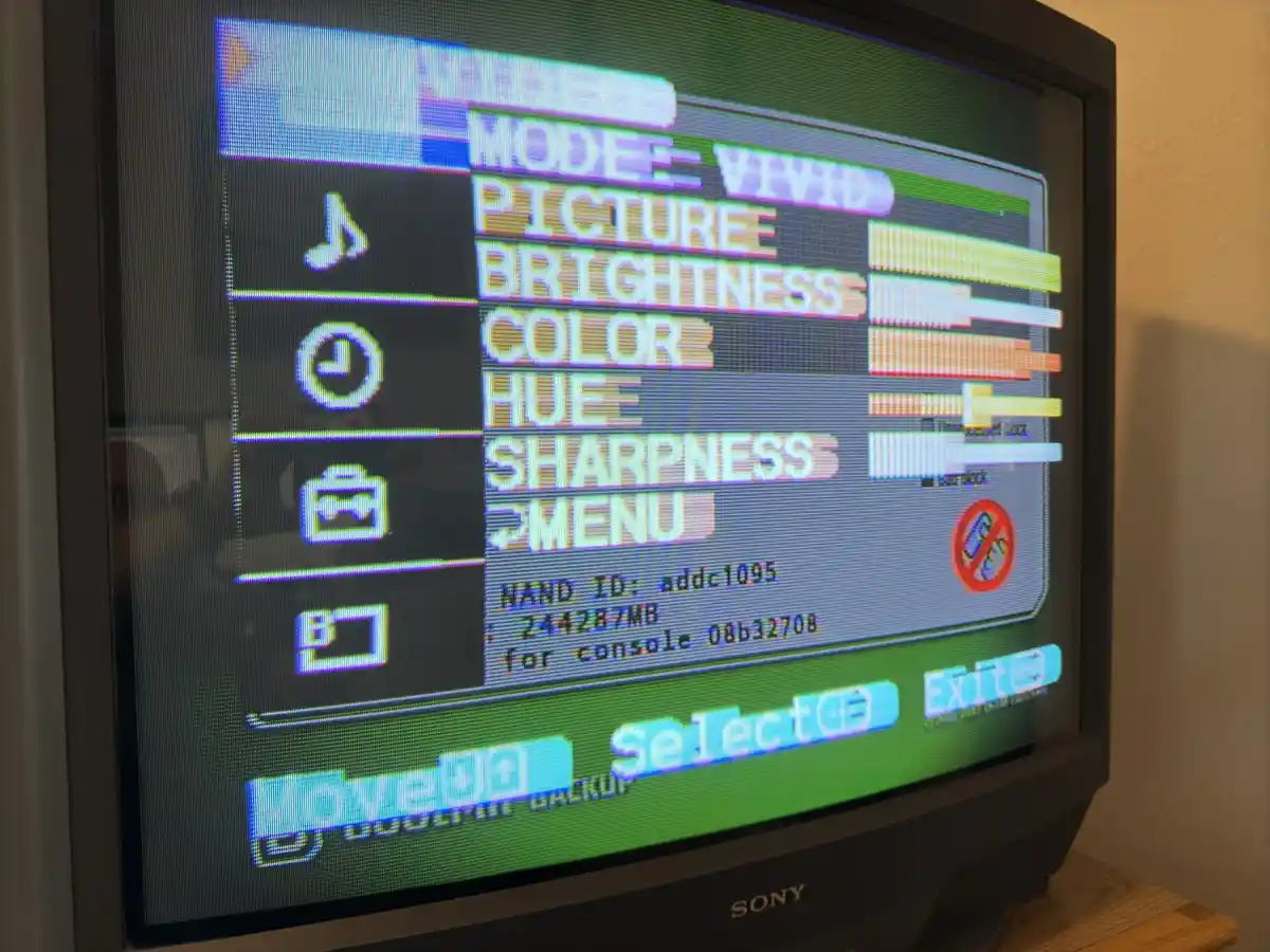 A close-up of a Sony TV screen displaying a retro video game console's picture settings menu with options like brightness…