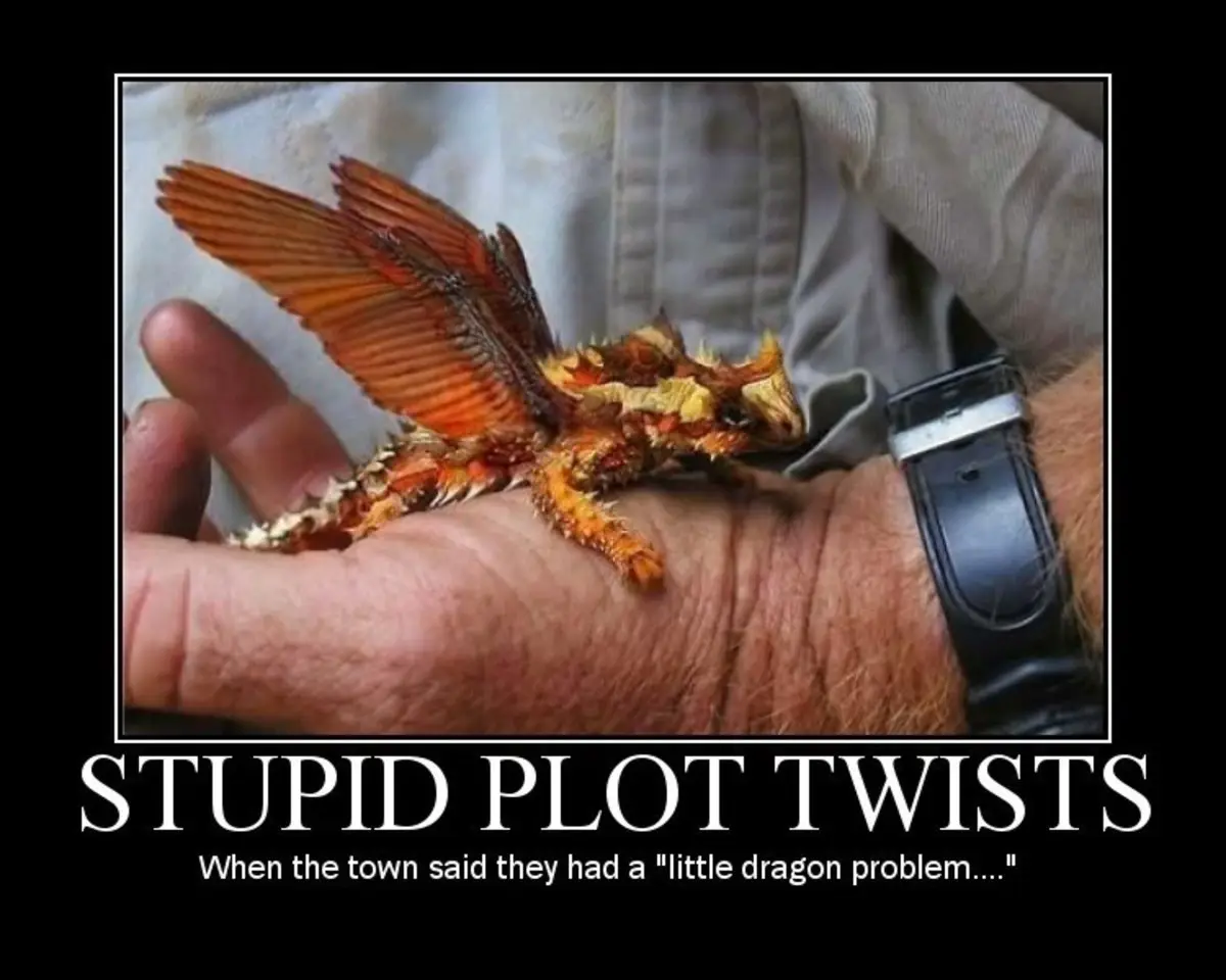 A small, spiky, orange and yellow dragon-like creature with wings is perched on a person's hand, which is resting on their…